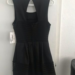 TrixxGirl Mini Black Dress